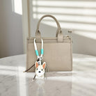 Hunde Anhänger | mit kleinen Ketten, Glöckchen und Schnüren | Taschenschmuck Taschenanhänger | Bag Charm mit Hund