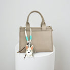 Hunde Anhänger | mit kleinen Ketten, Glöckchen und Schnüren | Taschenschmuck Taschenanhänger | Bag Charm mit Hund