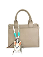 Hunde Anhänger | mit kleinen Ketten, Glöckchen und Schnüren | Taschenschmuck Taschenanhänger | Bag Charm mit Hund