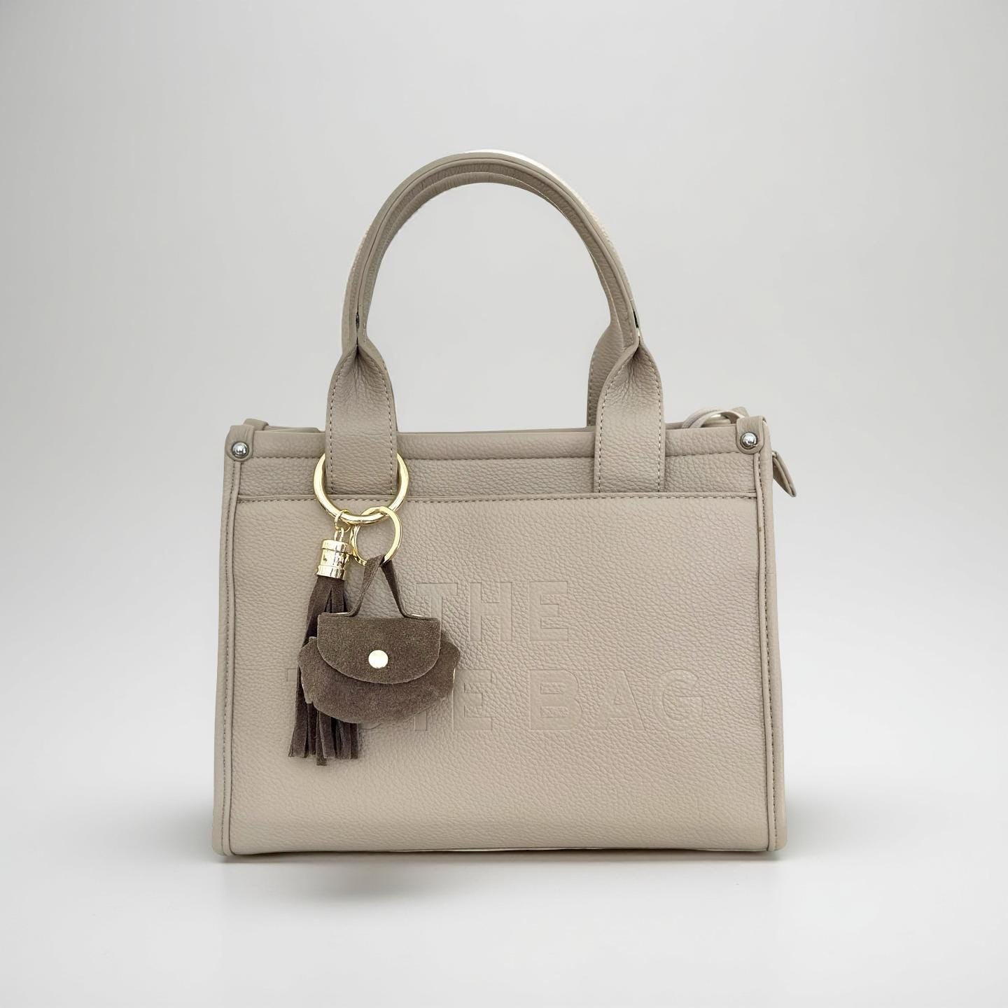 Brauner Anhänger aus Leder mit goldenem Karabiner | kleine Tasche und Quaste | Taschenschmuck Taschenanhänger | Bag Charm braun mit gold