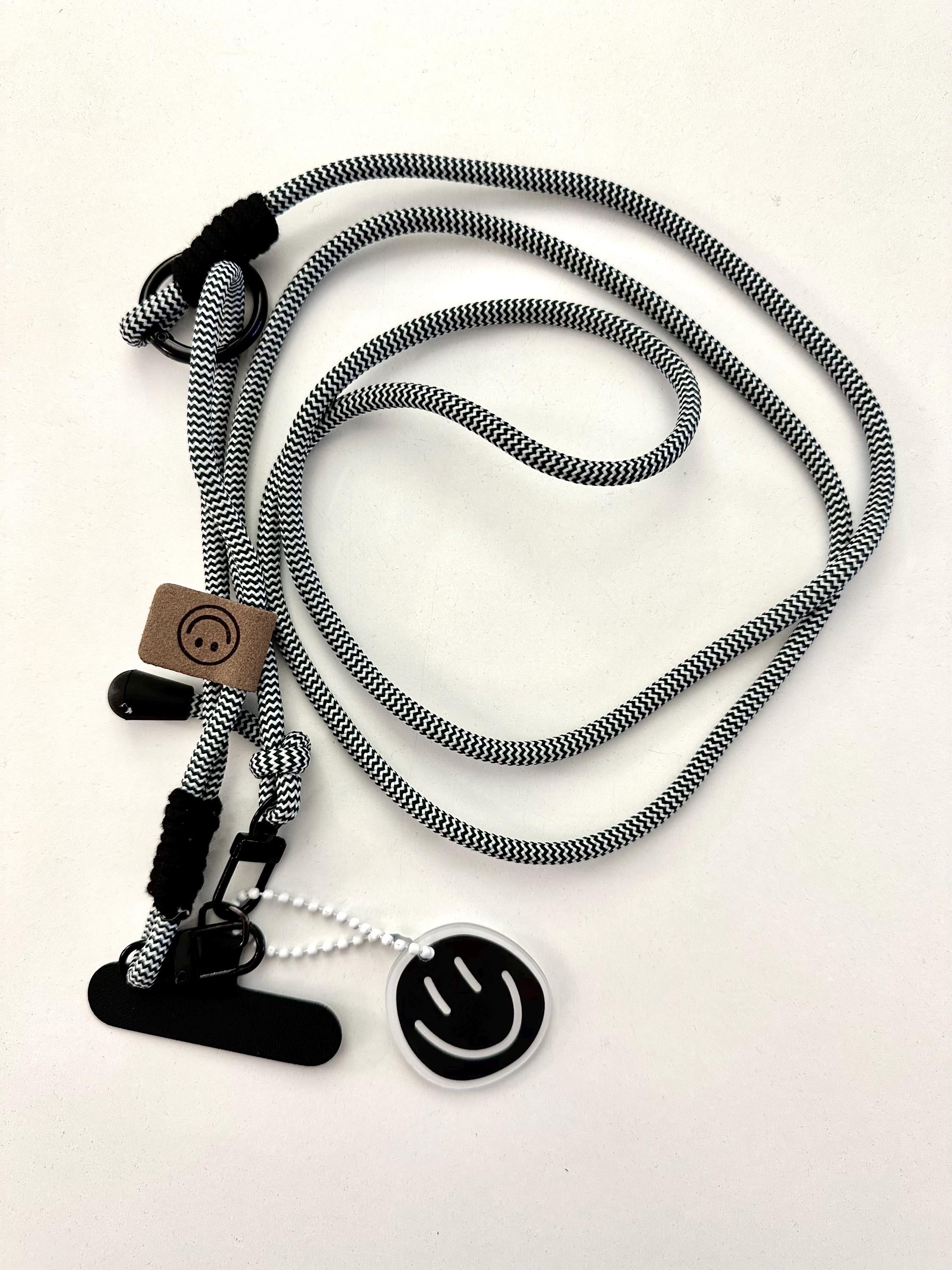 Edle Handyketten in schwarz weiß | universal Schnur Band für Mobiltelefone inkl. Adapter | pink | Smiley Anhänger | Perlen