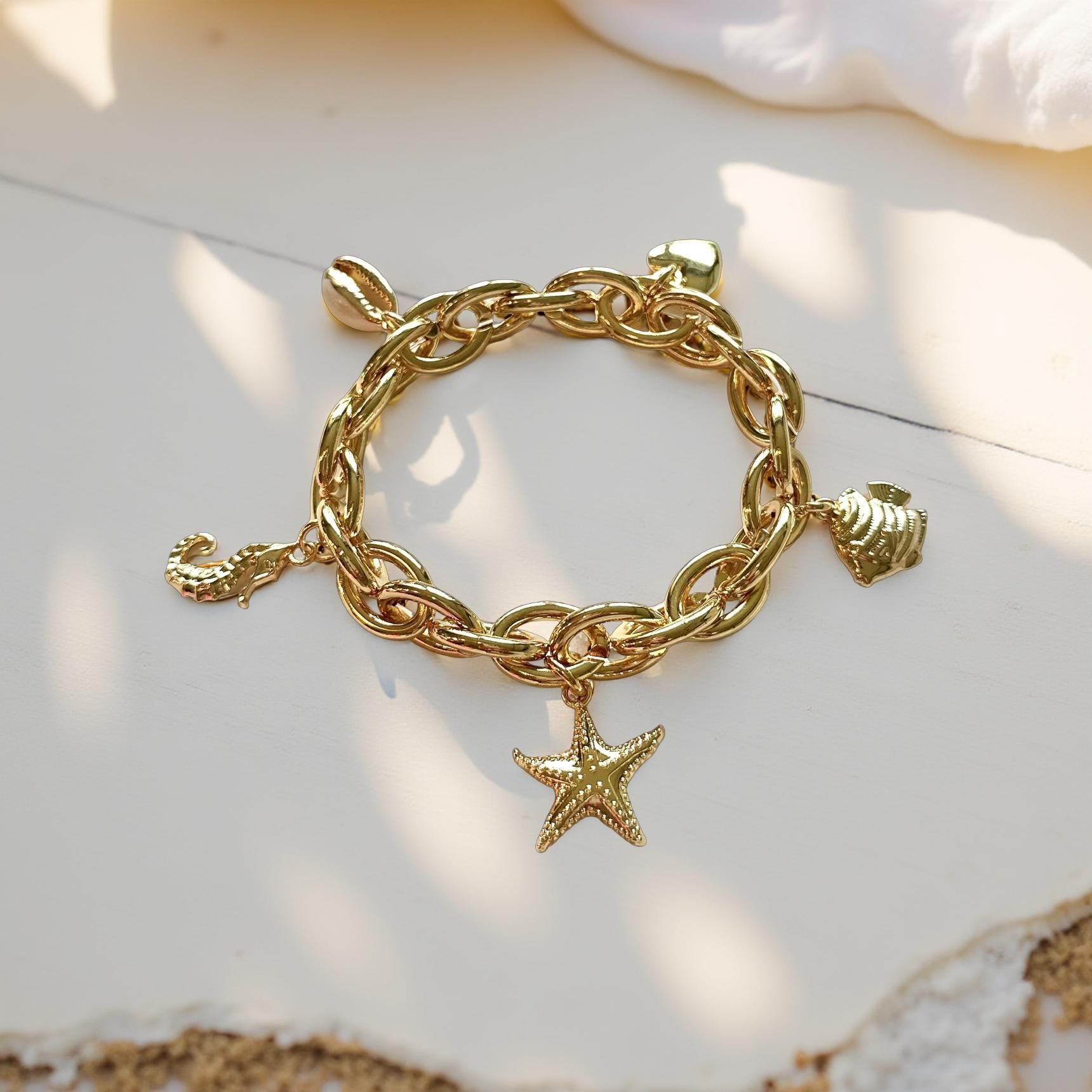 Goldenes Armband | elastisches Gliederketten Armband mit Charms wie Seestern, Seepferdchen, Herz, Fisch und Muschel