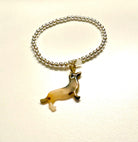 Goldenes Dackel Armband | kleines feines elastisches Perlenarmband mit Dackelanhänger