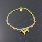 Goldenes Dackel Armband | kleines feines elastisches Perlenarmband mit Dackelanhänger
